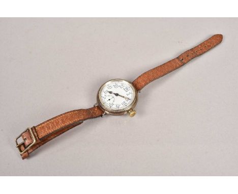 A WWI military style wrist watch, having a silver hallmarked case, dated Birmingham 1914 by Dennison Watch Case Co, serial 22