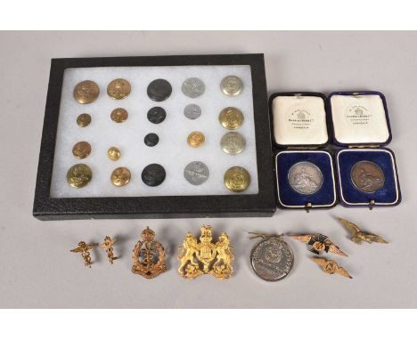 A small selection of Royal Air Force badges and buttons, to include a Chaplains badge, Dentistry Branch, RAF Medical, a selec