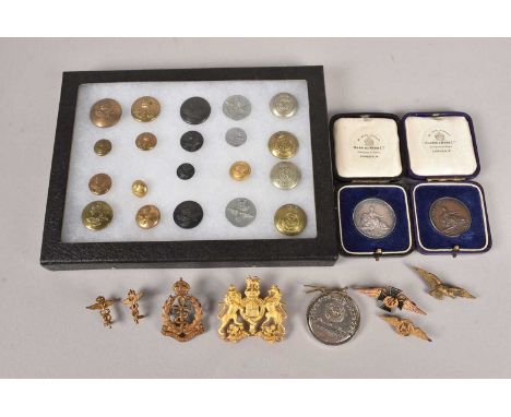 A small selection of Royal Air Force badges and buttons, to include a Chaplains badge, Dentistry Branch, RAF Medical, a selec