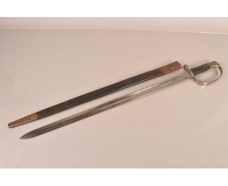 A British 1879 Artillery Sawback bayonet and scabbard, the bayonet being 66cm long with single fuller, with 23cm long sawback