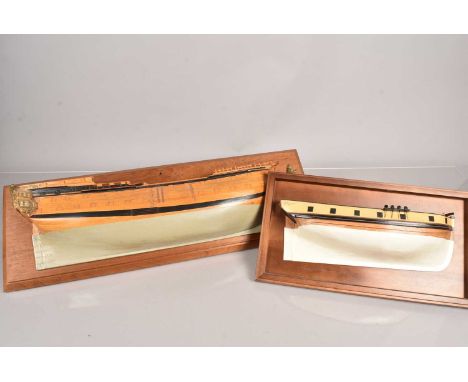 Two wall hanging half model of a ship, one of a galleon and the other of a small ship, 72cm and smaller (2)