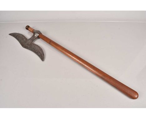 An Indo Persian Axe, having a moustache shaped head, with engraved design to the neck, having various lined decoration, on la