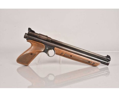 A Crosman American Classic Model 1377 .177 Air Pistol, serial 978054026, with under lever action and brown wood effect plasti