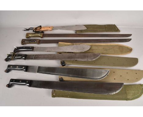 A collection of seven various machetes, to include a 1944 dated by Legitimus, two larger examples by Martindale and more, som