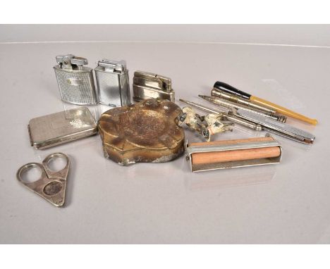 A Continental Silver Cigar Cutter, stamped with 835 and assay mark, together with three pocket lighters, (Ronson, The Roller 