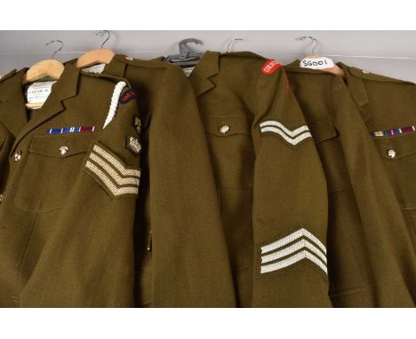 A group of ten No.2 Dress jackets, having numerous badges, for Coldstream Guards, The Blues and Royals, Royal Army Medical Co