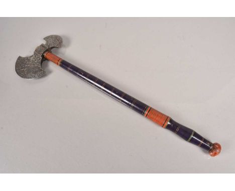 A Persian Double Headed Axe, having larger and smaller blades, the larger having elephant decoration to both sides, the small