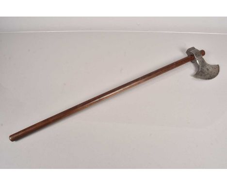 An Indo Persian Style axe, having an 11.5cm long single edged blade, having punched dot design, on later wooden shaft