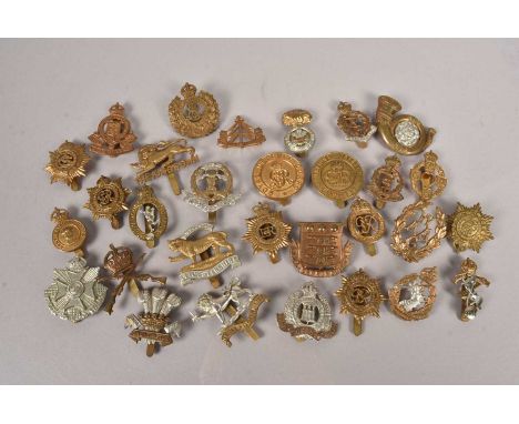British Cap Badges, comprising Royal Army Medical Corps, Army Service Corps, Army Ordnance Corps, Women's Army Auxiliary Corp
