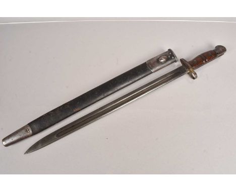 A P17 US Winchester bayonet converted for the British Home Guard, having stamps to either side of the blade, complete with sc
