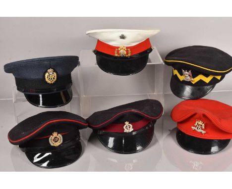 A collection of Military peak caps, from various Regiments and Ranks, to include Royal Air Force, Royal Scots Dragoon Guards,