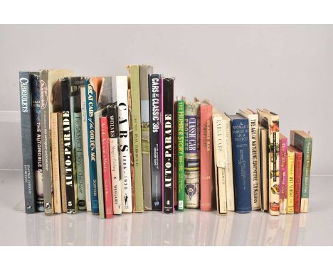 An assortment of vintage Motoring Books, including A Women's World-Tour In A Motor by Harriet White Fisher, Cabriolets by Jea