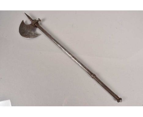 An Indo Persian Fighting Axe, having tubular steel shaft, concealing a stiletto four sided spike, spike 26cm, 58.5cm in total