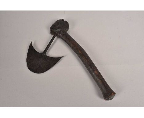 An African Hand Axe, possibly from the Shona Tribe, with spade shaped head, on elongated attachment, on wooden handle