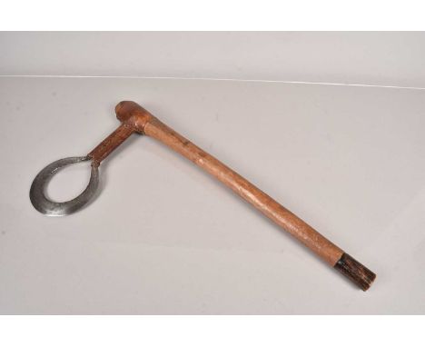 An African Hausa Tribe 'Ring' Axe, having circular ring shaped axe, with engraved design to the inside edge, having leather b
