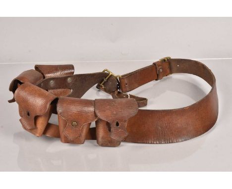 A WWI Bandolier by Hazel & Co, dated 1914, also stamped C & M, having five ammunition pouches