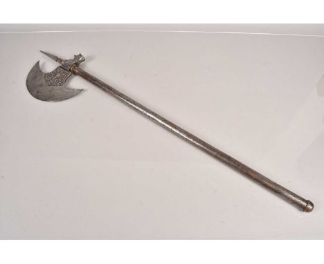 A Persian Qajar engraved steel axe, having  floral decoration, complete with 8.5cm spike to top, with tubular steal shaft, ov