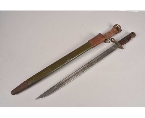 A US Remington 1918 Pattern Bayonet and Scabbard, the blade being stamped Remington 1918 to one side and US, Arrow and 26 to 