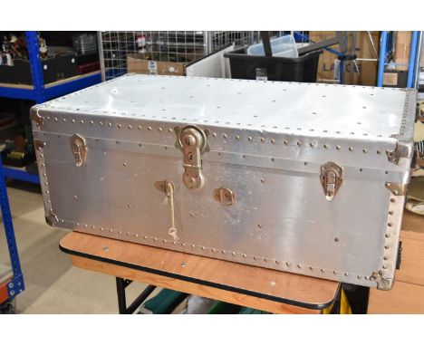An Aluminium Travelling trunk, 97cm x 53cm x 35cm