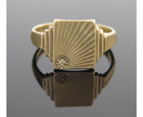 A Gent's 9ct Gold and Diamond Signet Ring with chased ray decoration, size U.5, 4.3g. 