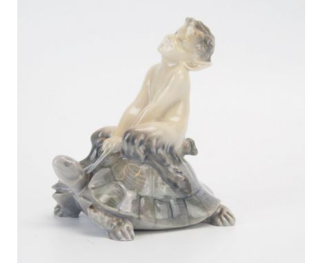 A Royal Copenhagen porcelain model No 858, Faun riding on a turtle, 10cm high. 