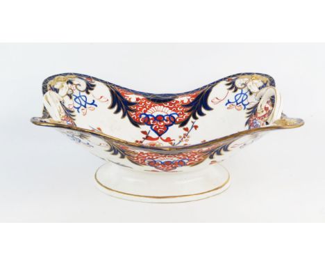 A Crown Derby pedestal rectangular serving dish, decorated in the Imari palette, heightened in gilt, with loop carrying handl