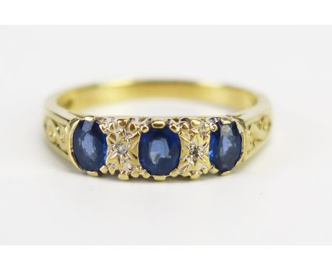 A 9ct Gold, Sapphire and Diamond Ring, size K.75, 2.4g