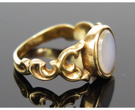 An Antique Unmarked Gold and White Stone Ring with pierced scrolling shoulders, size J, 2.7g 