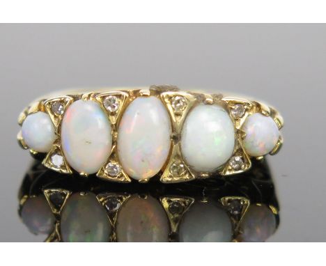 A 9ct Gold, Opal and Diamond Ring, c. 21mm long head, size K, 5g 