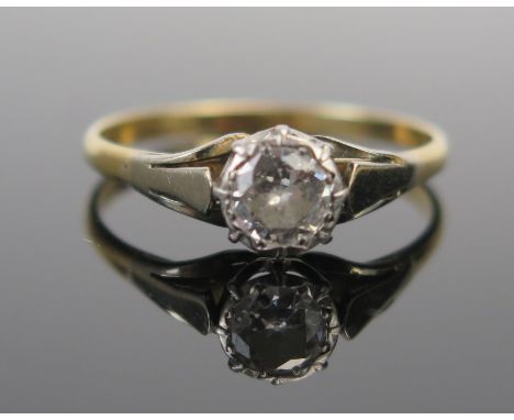 A Diamond Solitaire Ring in an 18ct yellow gold and platinum setting, c. 5.5mm stone, size Q.75, 2.3g 