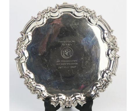 An Edward VII silver waiter, maker William Hutton &amp; Sons Ltd, London, 1900, inscribed , of circular form with moulded bor