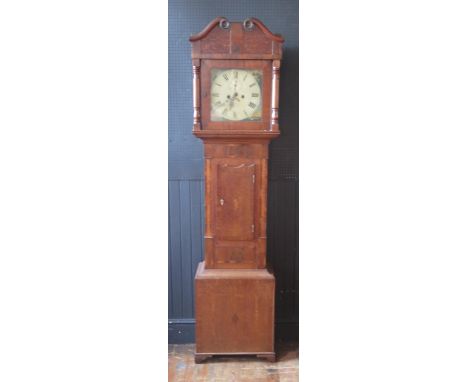 An early 19th century  mahogany, oak and crossbanded longcase clock, the arched hood with broken swan neck pediment, turned h