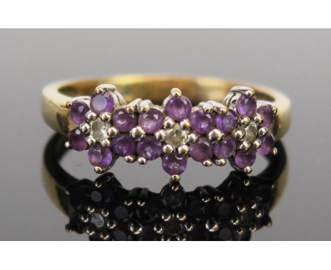 A 9ct Gold, Amethyst and White Stone Dress Ring, size R.75, 2.9g 