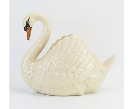 A large Dartmouth Pottery model of a swan, 35cm long. 