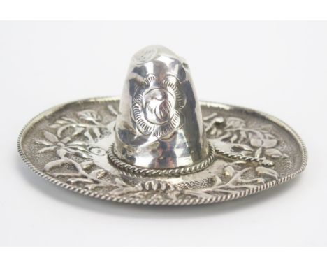 A Mexican silver model of a sombrero with embossed decoration, 12cm diameter, 46gms, 1.51ozs 