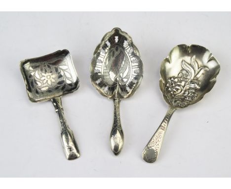 Three assorted silver caddy spoons, most marks rubbed and worn, total weight of silver 25gms, 0.83ozs 