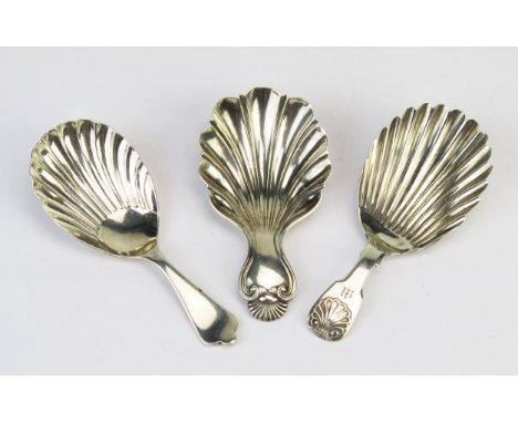 Three silver shell-shaped caddy spoons, makers Yapp &amp; Woodward,, Birmingham, 1846, Thomas Finlayson, Edinburgh, 1832 and 