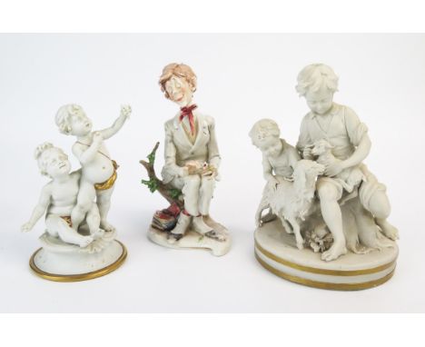 A Capo di Monte porcelain figurine "She loves me-she loves me not" 20cm high together with two bisque porcelain figure groups