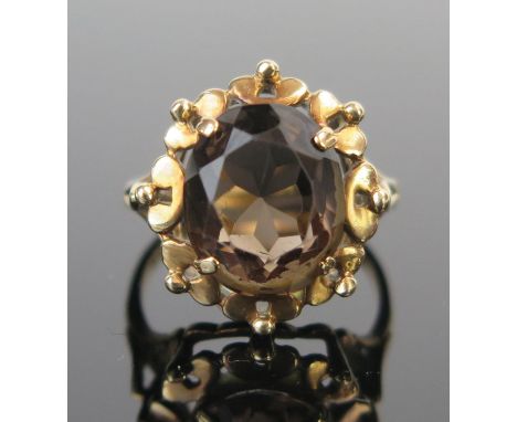 A 9ct Gold and Smoky Quartz Dress Ring, full London hallmarks, size L.5, 3.7g 