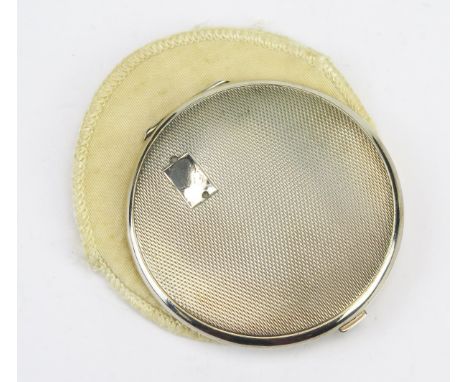 A silver circular powder compact, maker William Suckling Ltd, Birmingham, 1939 