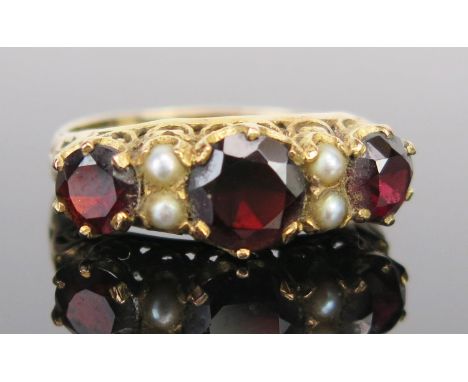 A 9ct Gold, Garnet and untested Pearl Ring, central stone c. 7mm, size P, 3.3g 