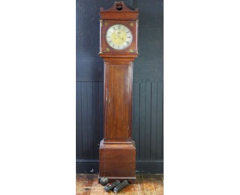 An early 19th century oak longcase clock, the arched hood with fluted columns, the trunk having a  plain field waist panel do