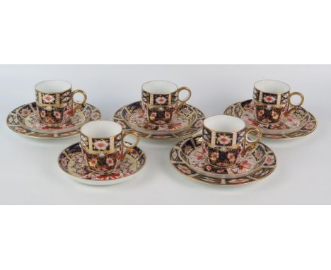 A Royal Crown Derby porcelain part coffee service, includes five coffee cans, five saucers and four side plates 