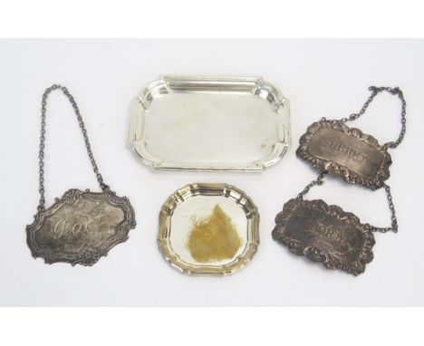 A mixed collection of silver and plated wares, various makers and dates, includes silver pin tray, three silver spirit labels