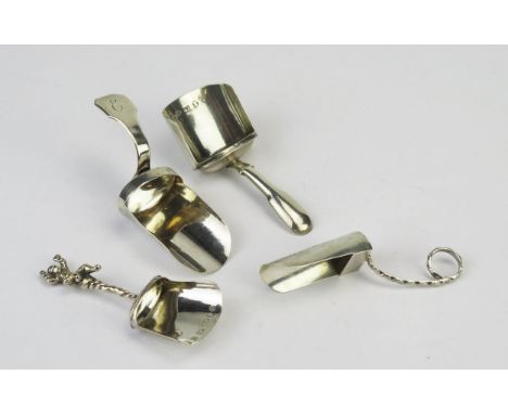 Four assorted silver caddy spoons, various makers and dates, total weight of silver 36gms, 1.17ozs. 