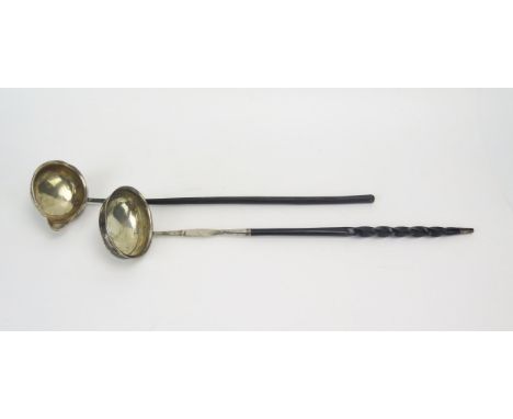 A Georgian silver toddy ladle, unmarked, monogrammed, the oval bowl mounted on a spiral twist baleen handle, 36cm long, toget