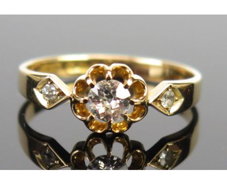 An 18ct Gold and Old Cut Diamond Three Stone Ring, Birmingham 1920, L&amp;W, central stone c. 4.1mm, size N, 2.3g 