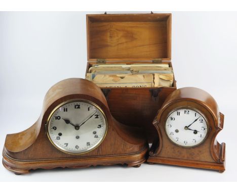 An oak mantel clock of arched outline, 50cm wide, a smaller arched mantel clock, 26cm wide together with a collection of 78 R