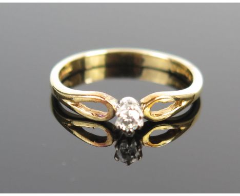 An 18ct Gold and Diamond Solitaire Ring, London hallmarks, c. 3mm diamond, size K.25, 2.1g 