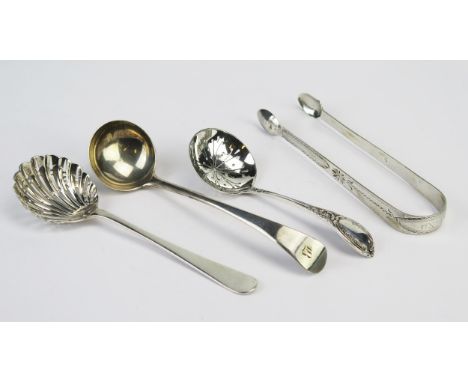 A mixed collection of silver flatwares, various makers and dates, includes sifting spoons, sugar tongs and sauce ladle, total